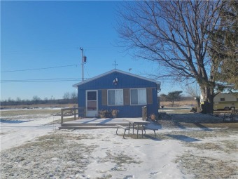Buy now and prepare for summer fun! SOLD - Beach Home for sale in Three Mile Bay, New York on Beachhouse.com