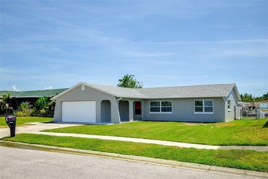 Beach Home For Sale in Holiday, Florida