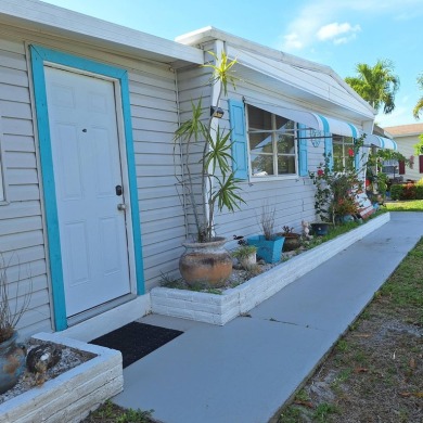 Beach Home For Sale in Atlantis, Florida