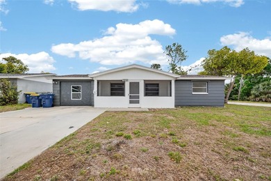 Beach Home For Sale in Holiday, Florida