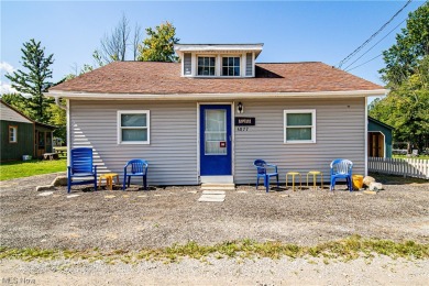 You have the opportunity to own this charming cottage situated - Beach Home for sale in Geneva, Ohio on Beachhouse.com