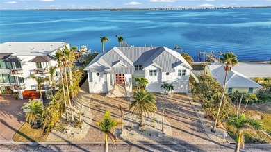 Beach Home For Sale in Holmes Beach, Florida
