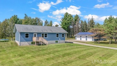 Beach Home For Sale in Rapid River, Michigan