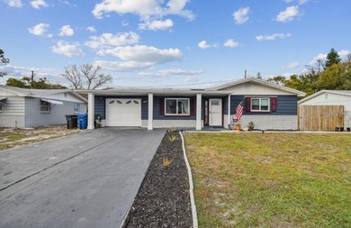 Beach Home For Sale in Holiday, Florida