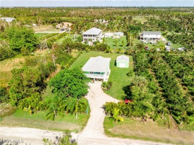 Beach Home For Sale in Bokeelia, Florida