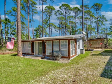 Beach Home For Sale in Alligator Point, Florida
