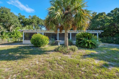 Beach Home For Sale in Alligator Point, Florida