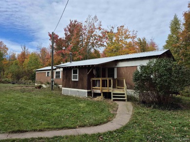 Beach Home For Sale in Big Bay, Michigan