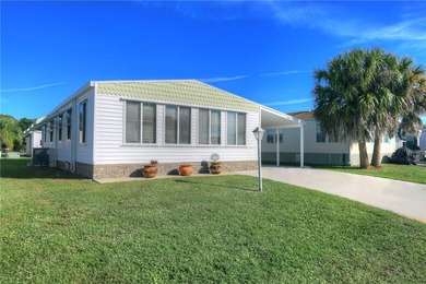 Beach Home For Sale in Barefoot Bay, Florida