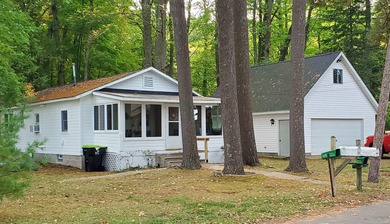 Beach Home For Sale in East Tawas, Michigan