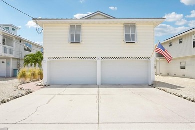 Beach Home For Sale in Holmes Beach, Florida