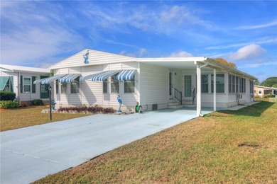 Beach Home For Sale in Barefoot Bay, Florida