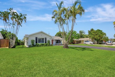 Beach Home For Sale in Lake Clarke Shores, Florida