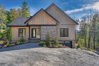 Home For Sale in Mont-Tremblant image photo picture