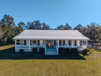 Beach Home For Sale in Horseshoe Beach, Florida