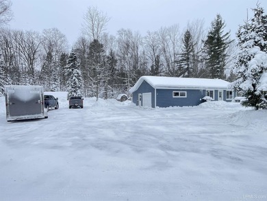 Beach Home For Sale in Rapid River, Michigan