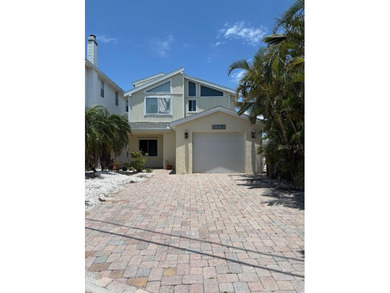 Beach Home For Sale in Madeira Beach, Florida