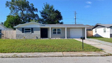 Beach Home For Sale in Holiday, Florida