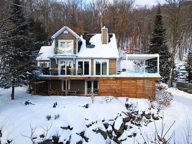 Home For Sale in Mont-Tremblant image photo picture