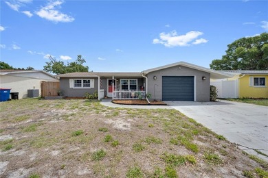 Beach Home For Sale in Holiday, Florida